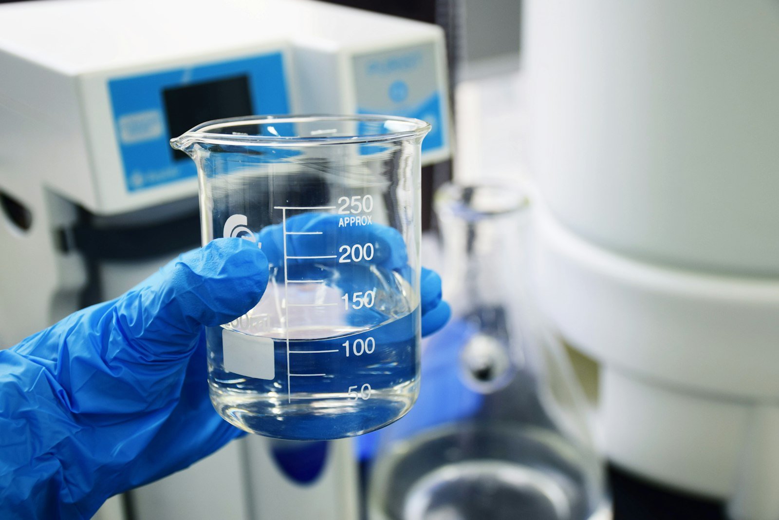 Laboratory beaker with a clear coating sample